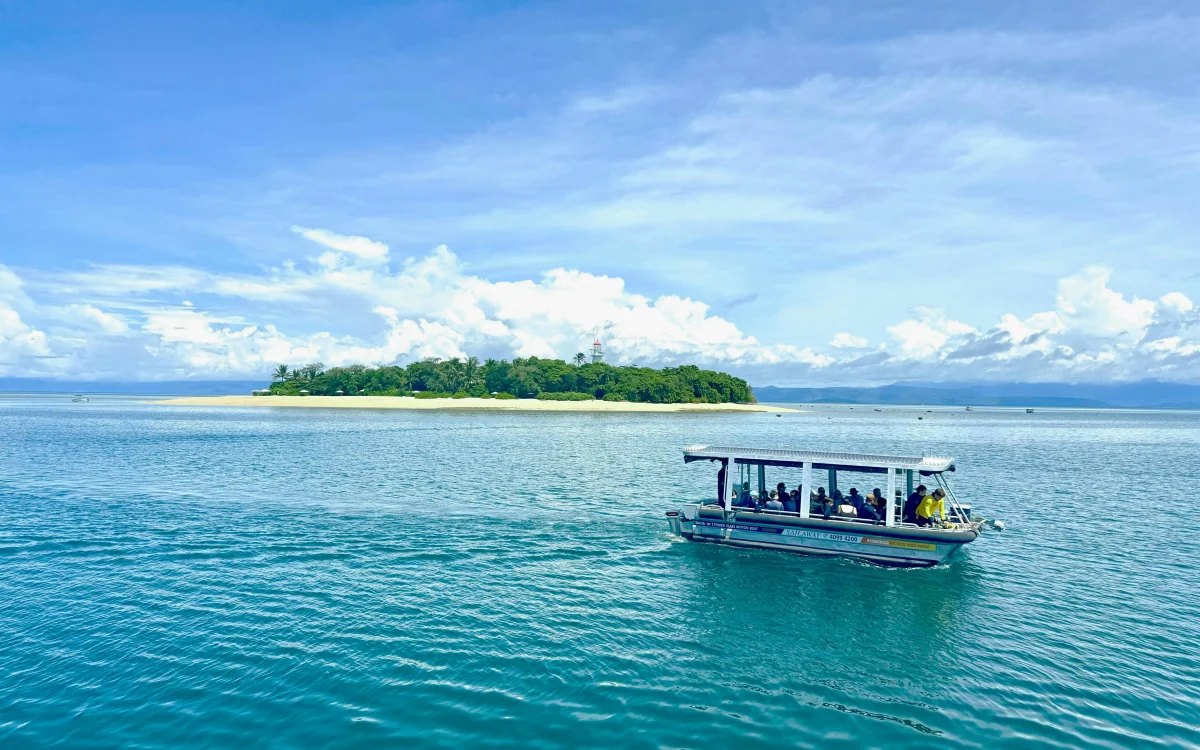 Coral underwater. Boat on the water.