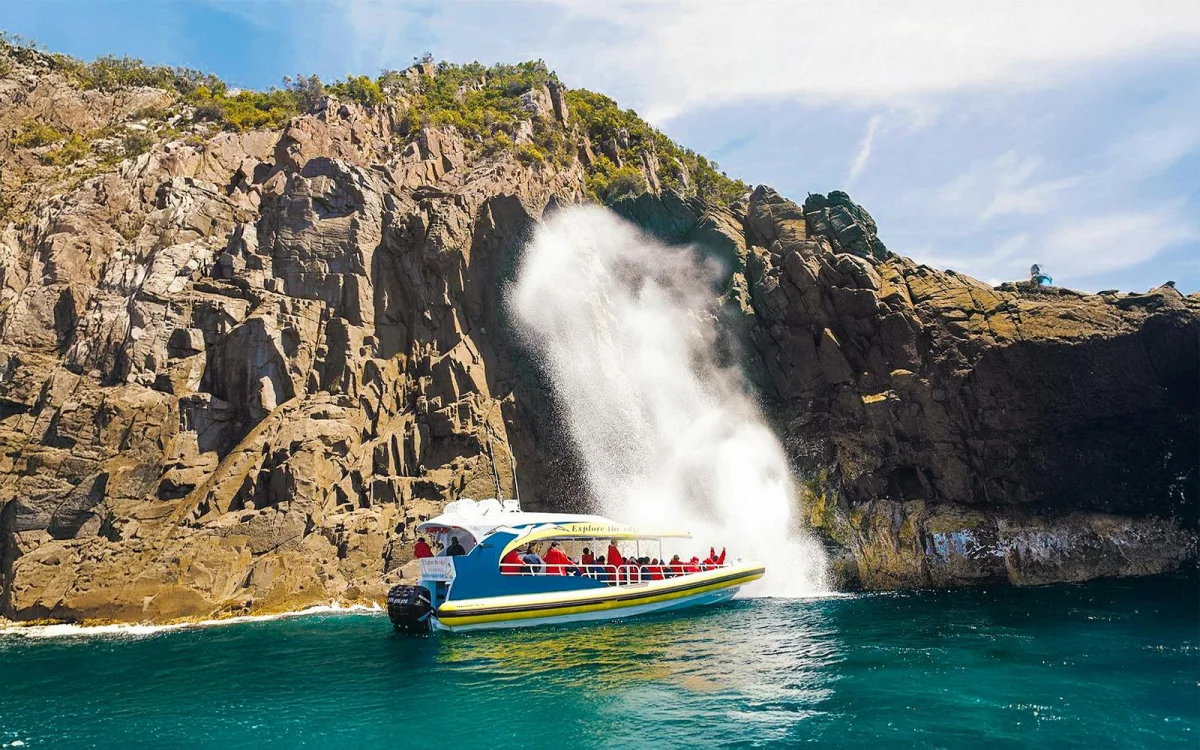 Boat on the water. Waterfall.