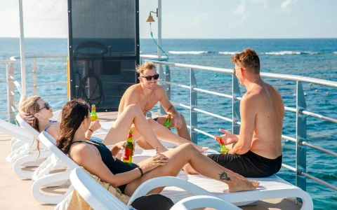 From Cairns: Outer Reef Snorkel Cruise with Pontoon Activities & Lunch by Reef Magic in Cairns